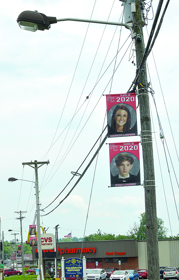 Banners honoring the Class of 2020 decorate US 27