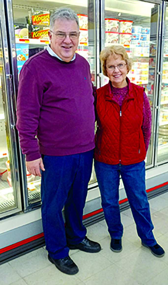 Roger Craig stands with his long-time employer (and cousin) Dixie Owen. The Wyatt family brought Craig in as a young man to manage the store, and he was manager when the ‘97 Flood nearly took it out. Craig’s leadership revived the store in a matter of weeks, and it has continued to thrive and to employ the community’s people into 2023
