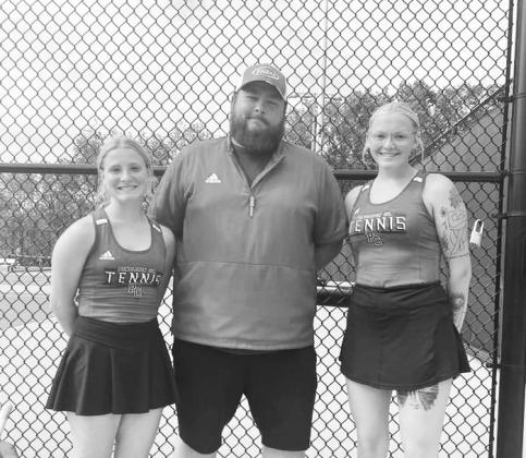The Ladycats doubles team of Emmie Dunn (left) and Maddie Duff (right) are pictured with coach Dillon Feltner following their regional tournament wins that qualified them for the state tournament. Photo provided by Stacey Myers