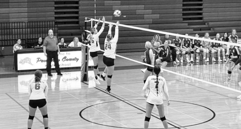 The Ladycat duo of Kearstin Mayer and Gracie Cotterman attacked the net against Gallatin County.