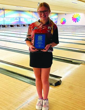 Ladycats bowler Kree Brewer poses with her All-Tournament Team plaque on January 6. Photo provided by Rhonda Hutchison.