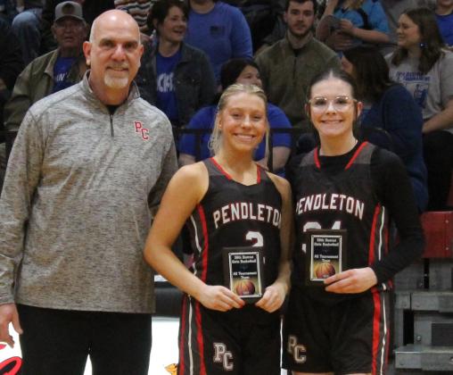 Following the conclusion of the 38th District Championship game, Ladycats sophomore Lilly Ashcraft (center) and freshman Hannah Spaulding (right) were named to the all-tournament team. Photo by Stacey Myers.