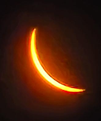 Doug Smith shot this photo from Falmouth, where the eclipse was 98.4 percent total.