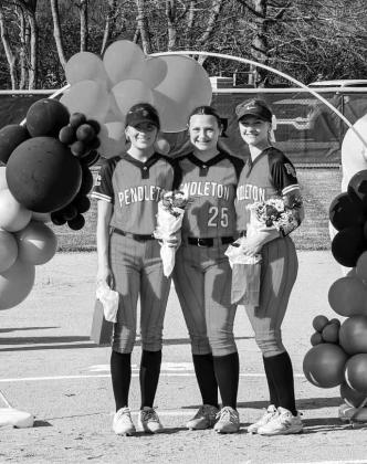Ladycats Fastpitch Softball seniors Avery Himes, Maddy Musk, and Reagan Anderson were honored before the April 17 game against Nicholas County. The team rolled to a 15-0 victory in three innings. Photo by Sam McClanahan