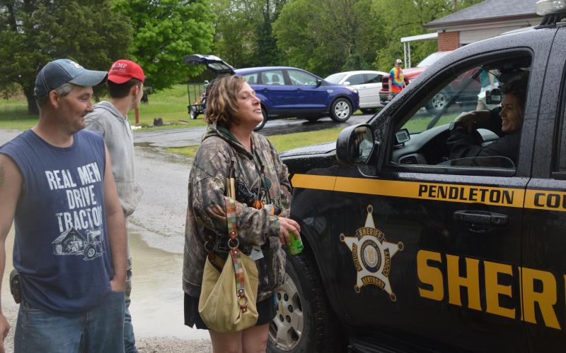 Pendleton County Deputy Sheriff Tish Dietz was talking to Falmouth residents about the flooding