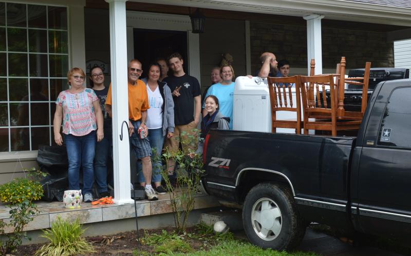 The Workman's lived through the flooding of their Pendleton Street home in 1997 and are back to moving things out in 2020