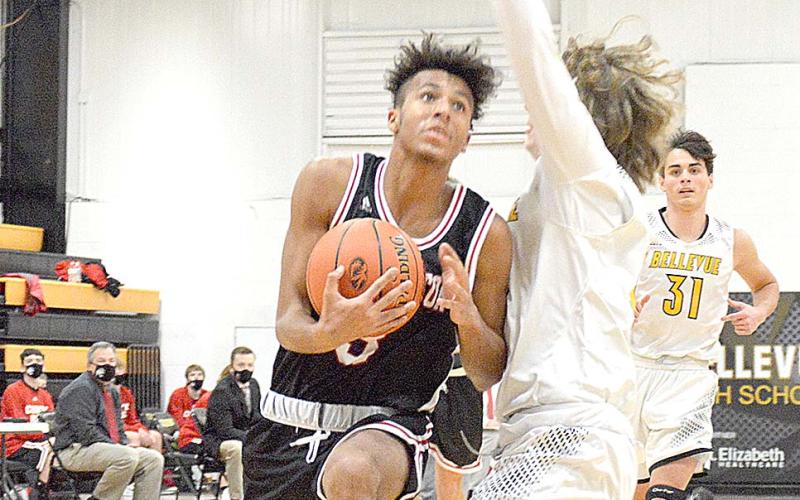 Tredyn Thomas drives against Bellevue. Photo by Sam McClanahan