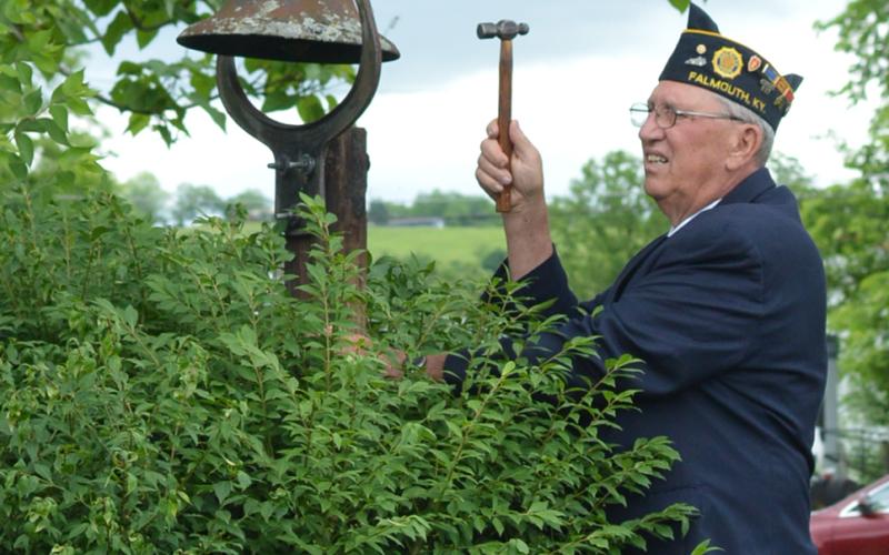 Henry Bertram rang the bell after each name was read during recognition of those who gave their life in WWII