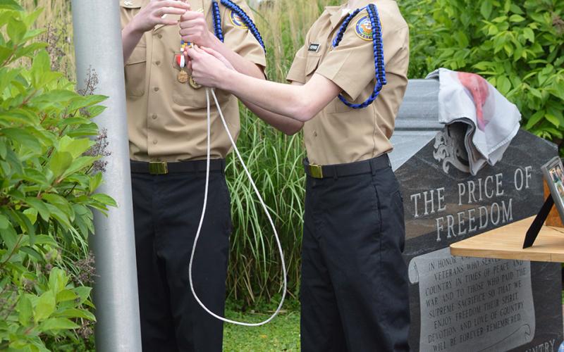 NJROTC lowered the flag to half mast