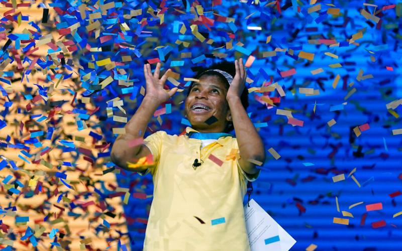 Zaila Avant-garde, 14, from Harvey, Louisiana is covered with confetti as she celebrates winning the finals of the 2021 Scripps National Spelling Bee at Disney World Thursday, July 8, 2021, in Lake Buena Vista, Fla. (AP Photo/John Raoux)