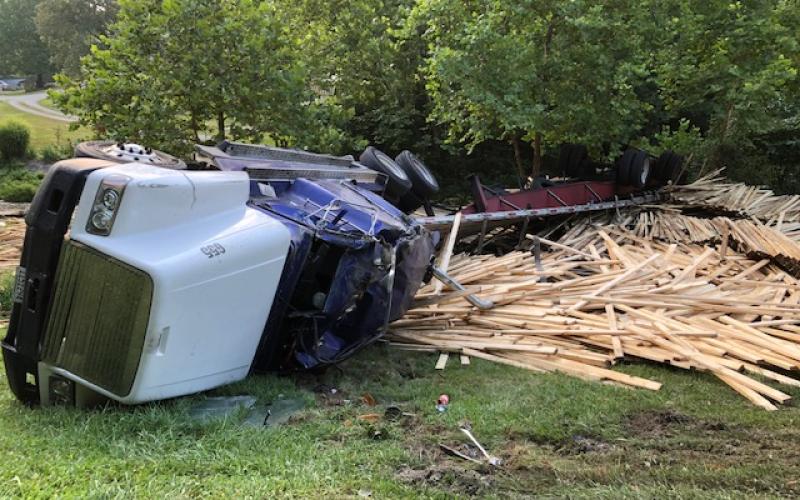 A semi from Alabama overturned at the intersection of HWY 177 and Butler-Greenwood Road, spilling lumber in its path.