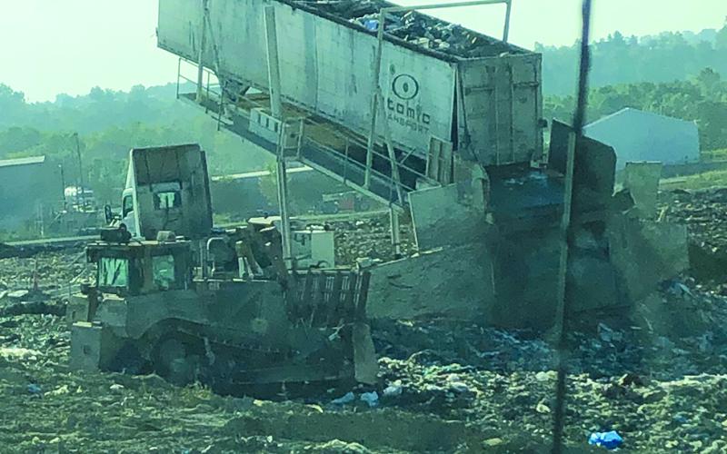 The tipper, shown here, unloads waste in the Butler Rumpke landfill. These semis travel Pendleton County roads nearly every day of the week, and their presence along with the presence of other trucks were was laid out as a concern during the course of the hearing. Trucks like the one pictured above were called into question during the hearing not only for the amount of travel they do along the roads in a day, but also for the tonnage of the individual vehicles that are loaded with garbage from other areas s