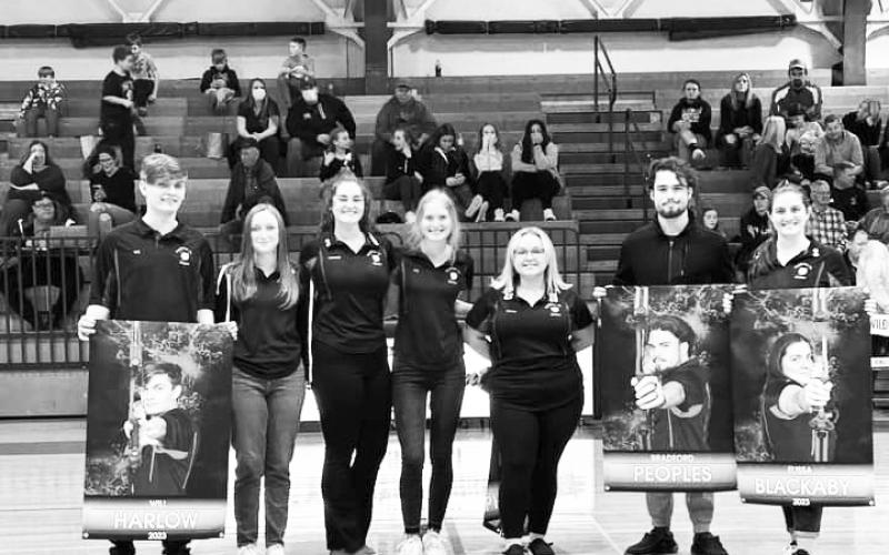 Prior to the start of the Wildcats varsity basketball game versus Augusta on February 7, the seven senior members of the Archery team were recognized. From L-R: Will Harlow, Lilly Brinkdoepke, Kennadi Mayer, Lilly Stephenson, Jeanna Craig, Bradford Peoples and Elissa Blackaby. Photo by Sam McClanahan.