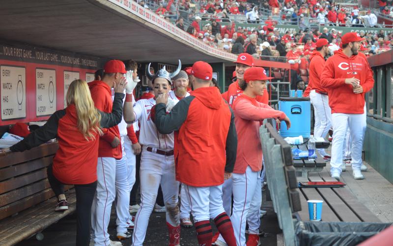 The Reds dugout celebrated a fourth-inning home run by third baseman Spencer Steer. Once he entered the dugout he sported a viking helmet that the team is using to honor players who hit home runs during the season.