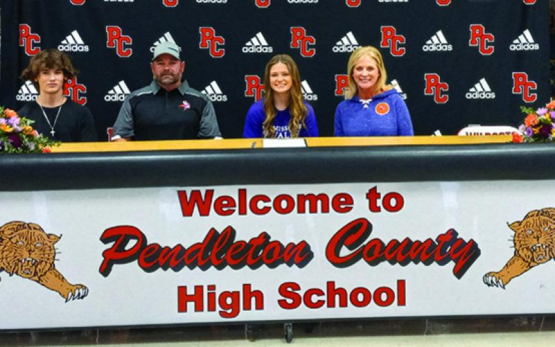 India Trimble signs with Missouri Valley, a college she approached in order to continue her cheerleading career.