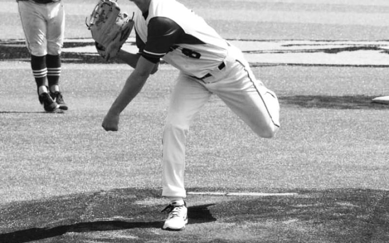 Pitcher Jacob Frisch helped Pendleton pick up their first win on April 1 over Gallatin County. Photo by Billie Neltner