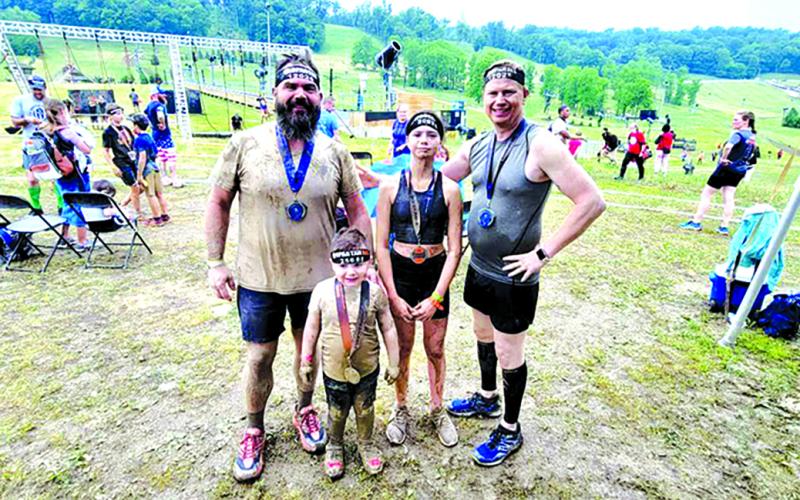 It's a family affair with Fred Harmon II, Dorothy and James Beebe, and 4-year-old Fred Beebe III, all running the Spartan Race