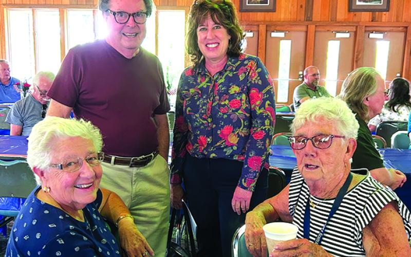 Danny Woodhead was also on the board for a number of years. He is pictured here with daughter Mary and friends Joyce Flaugher and Sue Emminger.