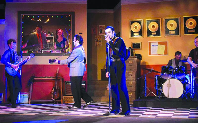 English, as Johnny Cash, sings “Sixteen Tons” while accompanied by Henrickson and Roberts. Also joining in are Brother Jay (Zach Gutman) on double bass and “Fluke” Holland (Garrette Koeninger) on drums.