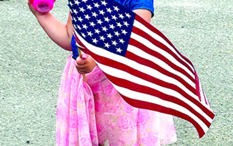 She may not have been sure what it was all about, but she flew her flag high!