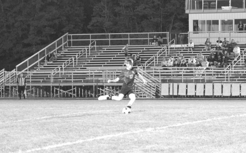 Sophomore Adam Beebe looks to score a Wildcats goal against Paris. Photo by: Sam McClanahan.