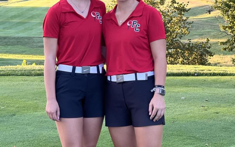 Ladycat seniors Katie Wright and Reese Barlow were honored by the program following the September 13 match with Bishop Brossart. Photo by Jill Wright.