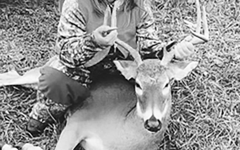 Tinley Quinn, age 9,  got her very first buck