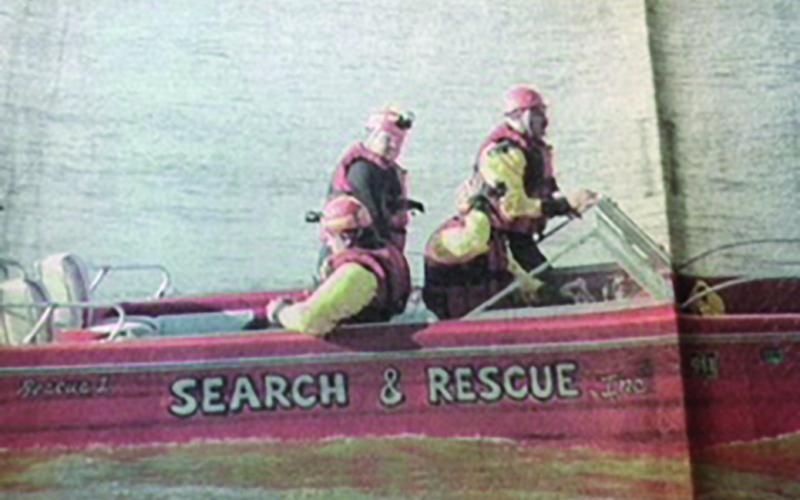 Bill Smallwood, Ron Said, Mike Martin, and Darrin Brown on a search mission in the boat donated by Falmouth, MA.