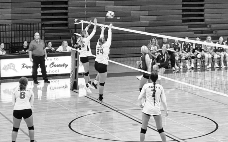 The Ladycat duo of Kearstin Mayer and Gracie Cotterman attacked the net against Gallatin County.
