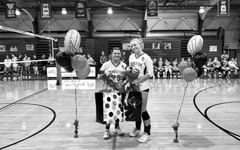 Ladycat volleyball seniors Lindsey Arkenau and Skyla Harrison were honored by the team before their home matchup with Augusta.
