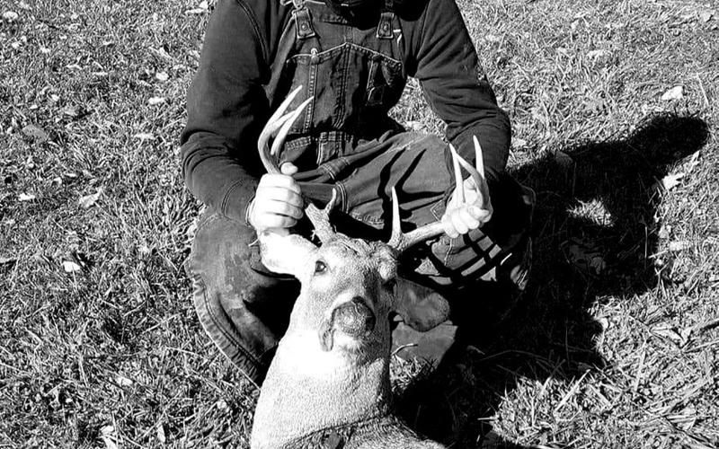 Jonathan Frisch, Jr. poses with his eight-pointer he got on opening day. Photo courtesy of Laura Frisch.