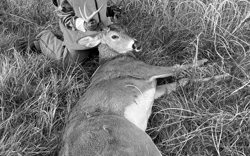 Luke Robbins smiles with his nine-pointer he claimed November 12. Photo provided by Dustin Robbins.