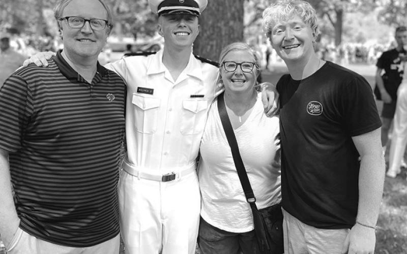 Justin, Brennan, Carrie, and Collin McElfresh are reunited during Parent Weekend at the United States Naval Academy in Annapolis, MD.