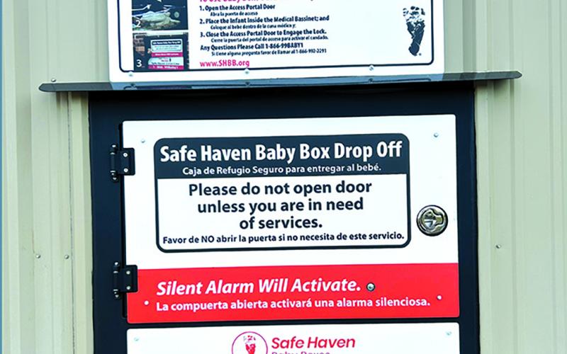 The Safe Haven Box opens like a door from the outside. As it opens, an alarm sounds to alert responders that someone has opened the box. Once a child is placed inside, a harmless laser beam, much like a garage door safety device, detects a baby is in the box. Within five minutes, the child can be dropped off and retrieved, all safely. The person dropping off the infant remains anonymous. The box is placed away from cameras in order to protect the person’s identity.