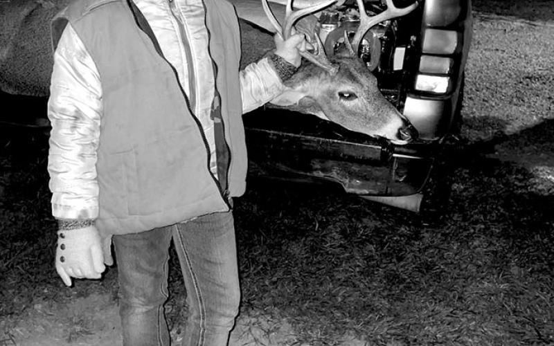 Adalynn Robbins proudly shows off her eight-pointer that she took down November 13. Photo provided by Dustin Robbins.