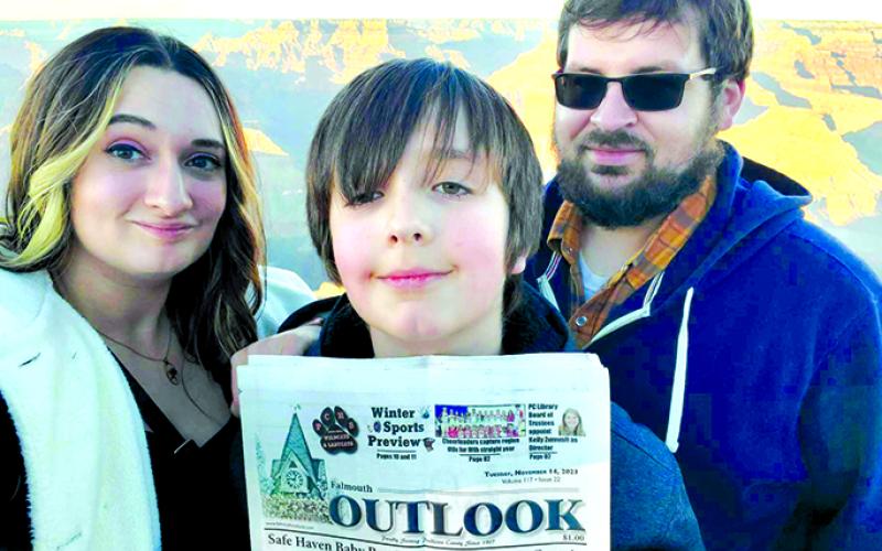 Emily Reed, Zachary Torline (holding the Falmouth Outlook), and Anthony Cox recently went to the Grand Canyon and also explored Arizona, Utah, New Mexico, and Colorado. While they were there, they not only read the latest edition; Emily and Anthony got engaged. Congratulations!