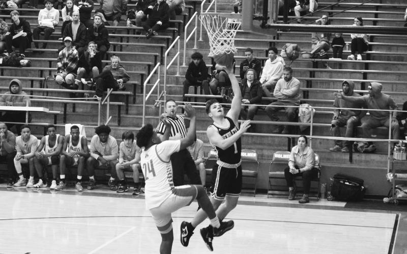 Senior Hunter Jack drives in for a layup during the Wildcats road victory at Holmes. Photos by Sam McClanahan.