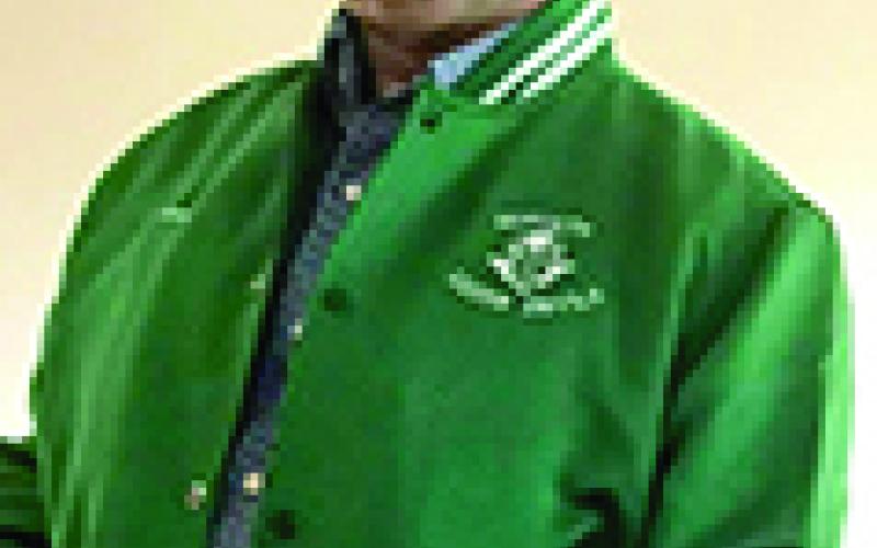 Basketball star Lonnie Gregg proudly wears a Goforth Green Devils jacket made by Jake Peoples.