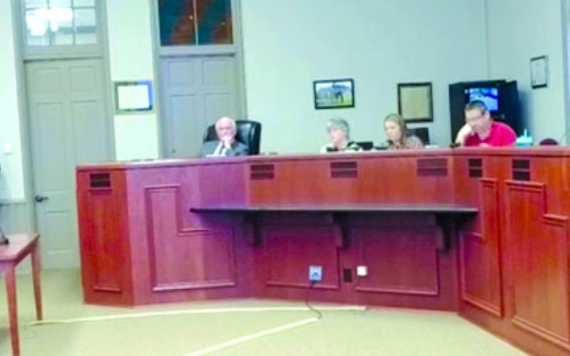 Luke Morgan, an attorney who has been active for more than 35 years, presents the evidence and his legal opinions to Falmouth City Council during the hearing surrounding the impeachment of Mayor Sebastian Ernst. Robert McGinnis, left at the bench, served as presiding officer and mediator of the proceedings. McGinnis is a retired circuit judge for the county, and he served in the same role for the impeachment hearing of former Mayor Elonda Hinson in 2017.