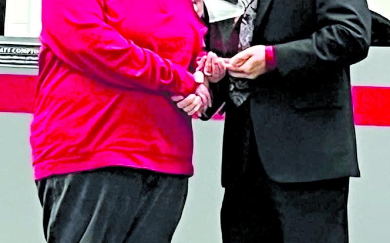 White recognized in  December school board meeting as recipient of the PC Pride Award