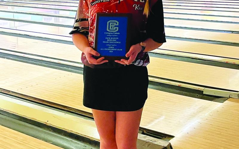 Ladycats bowler Kree Brewer poses with her All-Tournament Team plaque on January 6. Photo provided by Rhonda Hutchison.