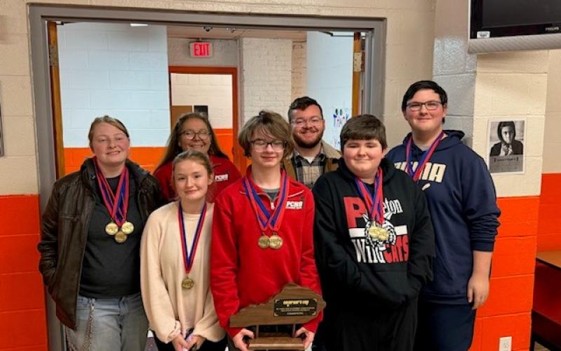 Pendleton County High School's Academic Team's Quick Response unit pose with their medals and trophies after placing second in District Competition while helping the Academic Team placed first overall. Quick response team members are, front row from left, Evan Stamper, Emily Fultz, Autumn Webster, Chase Stayton and Matthew Lambert, and back row, coaches Kim Bowen and Cullen Beard.