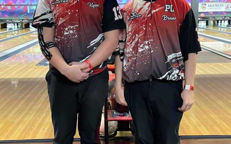 Kree Brewer and Maddie Crawford became the first Ladycats to represenKyan Brewer and Bradley Brann represented the Wildcats in singles competition. Photo by Rhonda Hutchison.