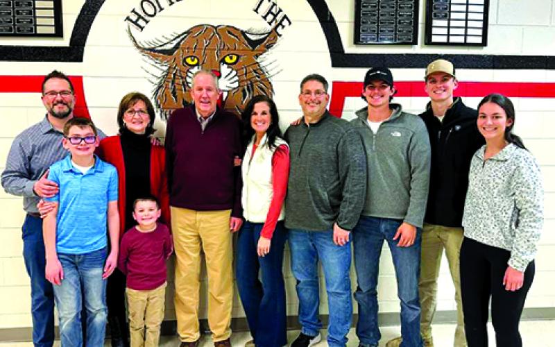 Retired teacher, administrator and coach Steve Craig, fifth from left, celebrates with family Feb. 13 after being inducted as the newest member of the Pendleton County High School Athletics Hall of Fame.