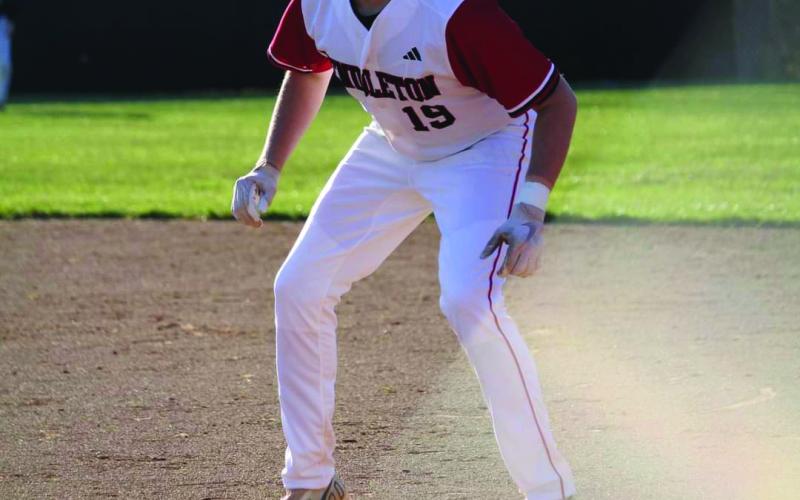 Abraham Beebe looks to steal a base. Photos courtesy of Sonja Barnard and Lisa Cooper.