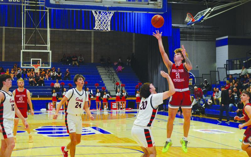 Senior forward Hunter Cox rises above his defender for a floater.
