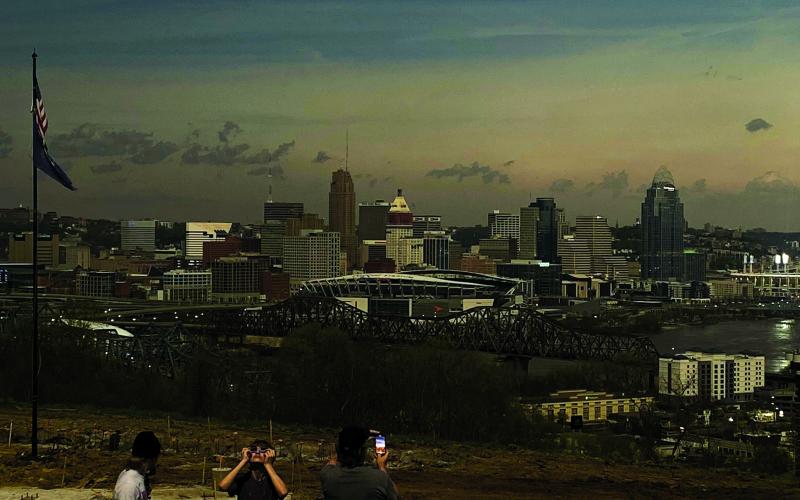 Brian Gregg of Butler and daughter Briana drove to Devou Park in Covington to view the eclipse. Brian took this photo of midday darkness falling over Cincinnati. “It was one of the most impressive things we have experienced with nature,” Gregg said.