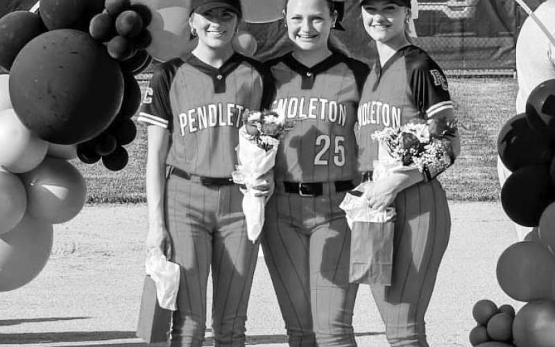 Ladycats Fastpitch Softball seniors Avery Himes, Maddy Musk, and Reagan Anderson were honored before the April 17 game against Nicholas County. The team rolled to a 15-0 victory in three innings. Photo by Sam McClanahan