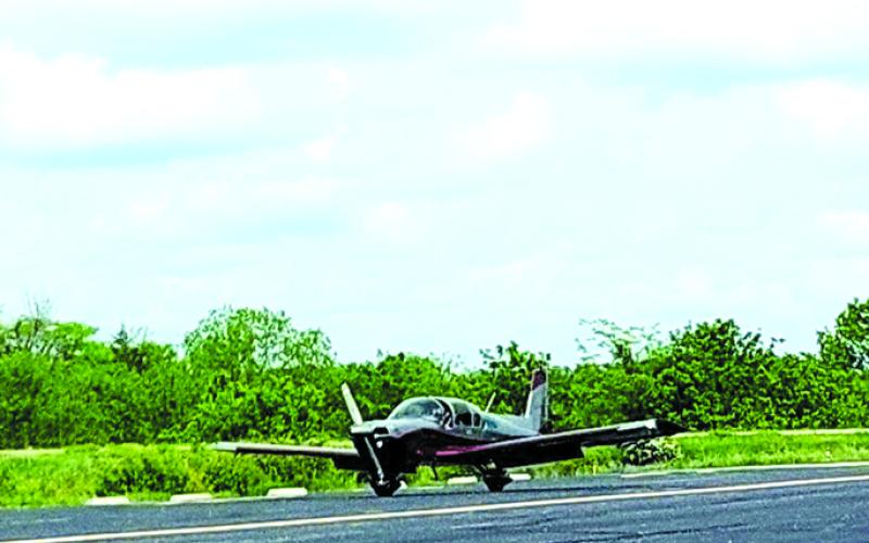 Angel Flight East pilot Jeremy Nissley lands at the Gene Snyder Airport in Falmouth. Photo by Jemi Chew.
