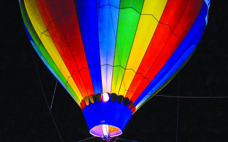 Balloon and Tunes glow event